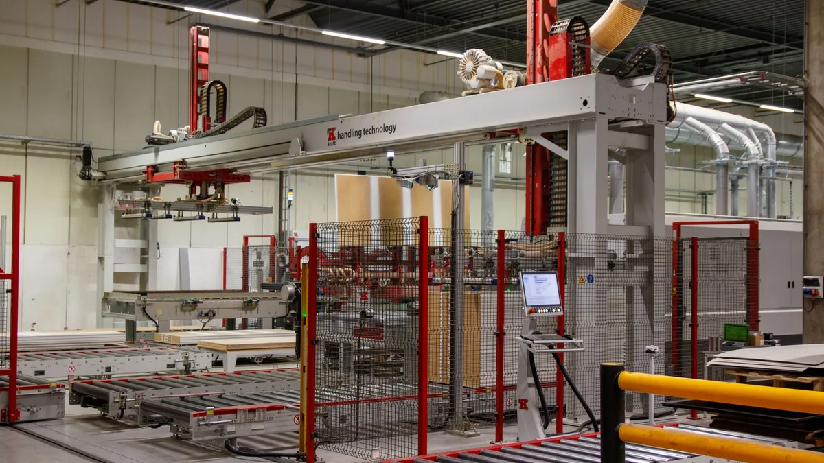 Robotic arm on a production line illustrating rule-based automation